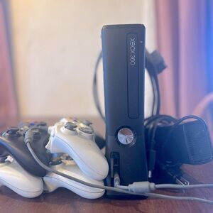 XBOX 360 Slim with 4 controllers and all adapters/connections needed.